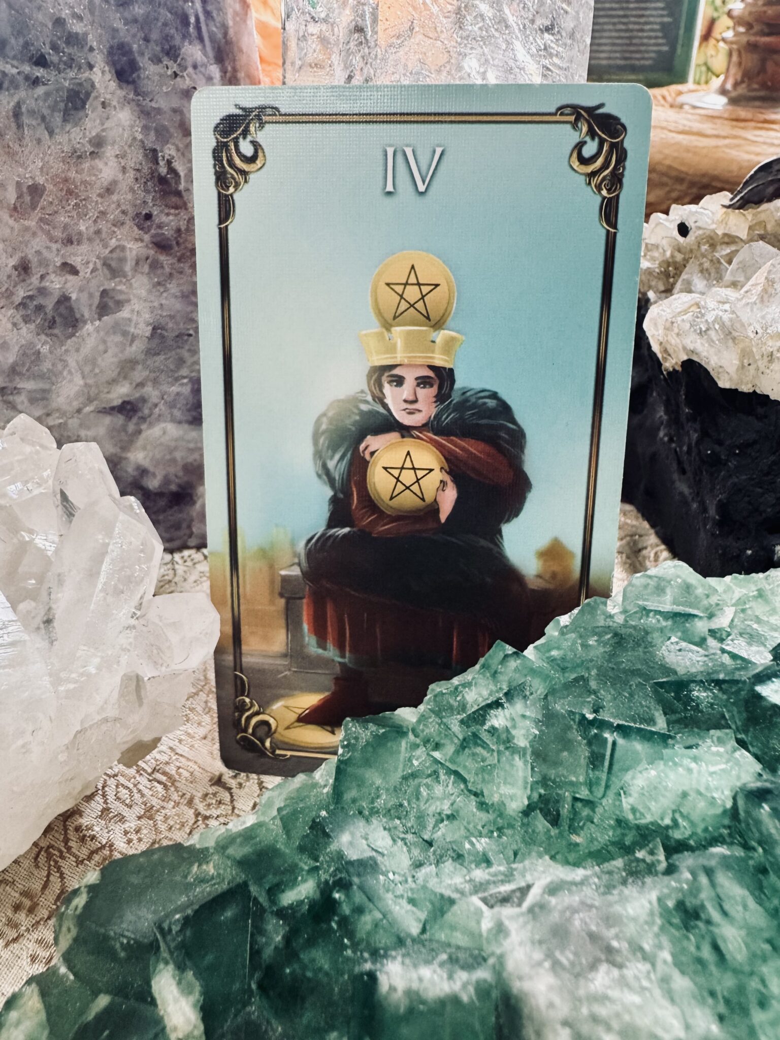 4 Pentacles
